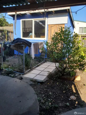 a kitchen with a stove and a refrigerator
