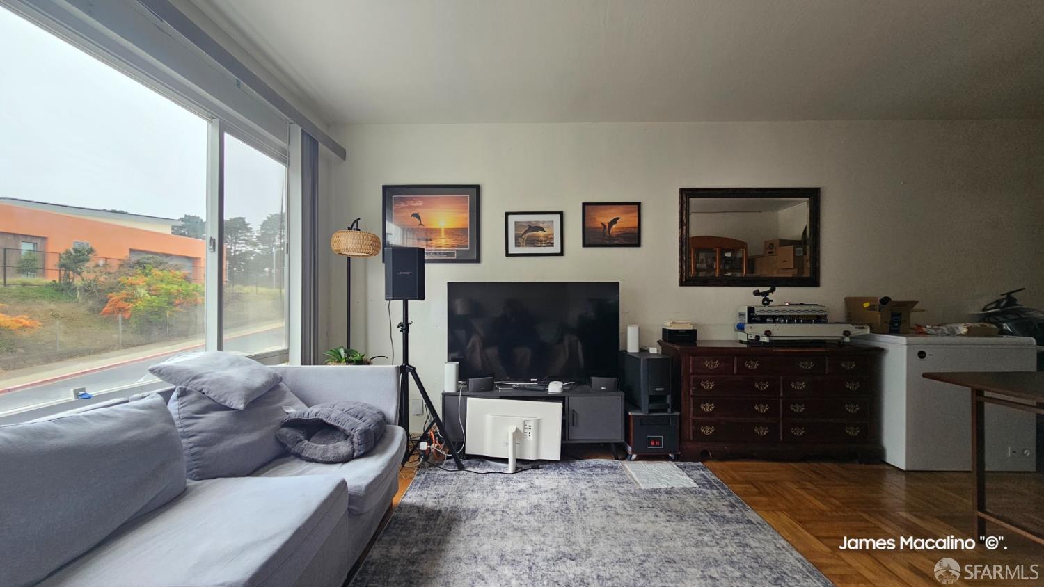 183 Mariposa Avenue Daly City, CA 94015 - Photo 24 of 27 a living room with furniture and a flat screen tv