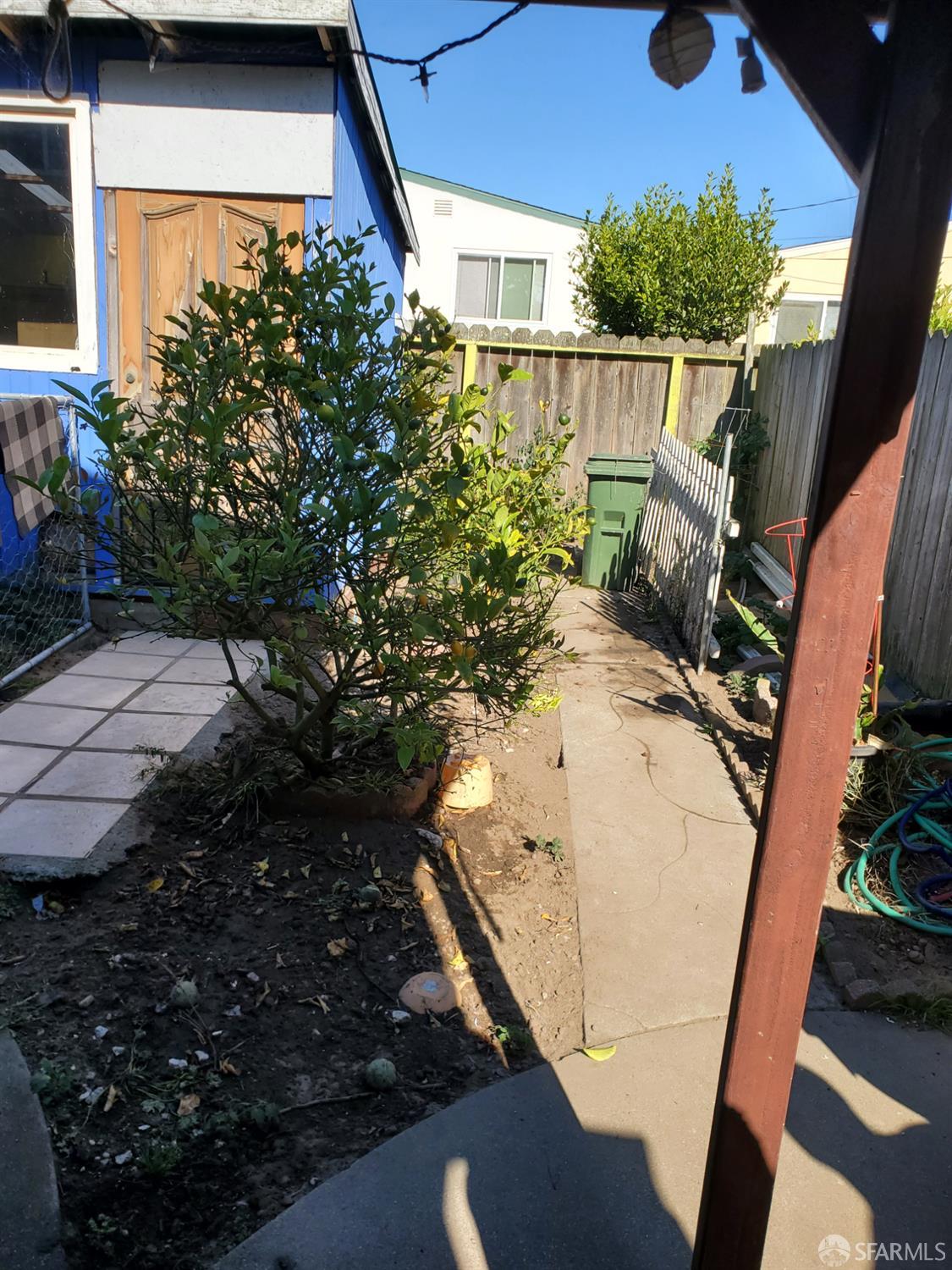 183 Mariposa Avenue Daly City, CA 94015 - Photo 26 of 27 a view of a backyard with sitting area