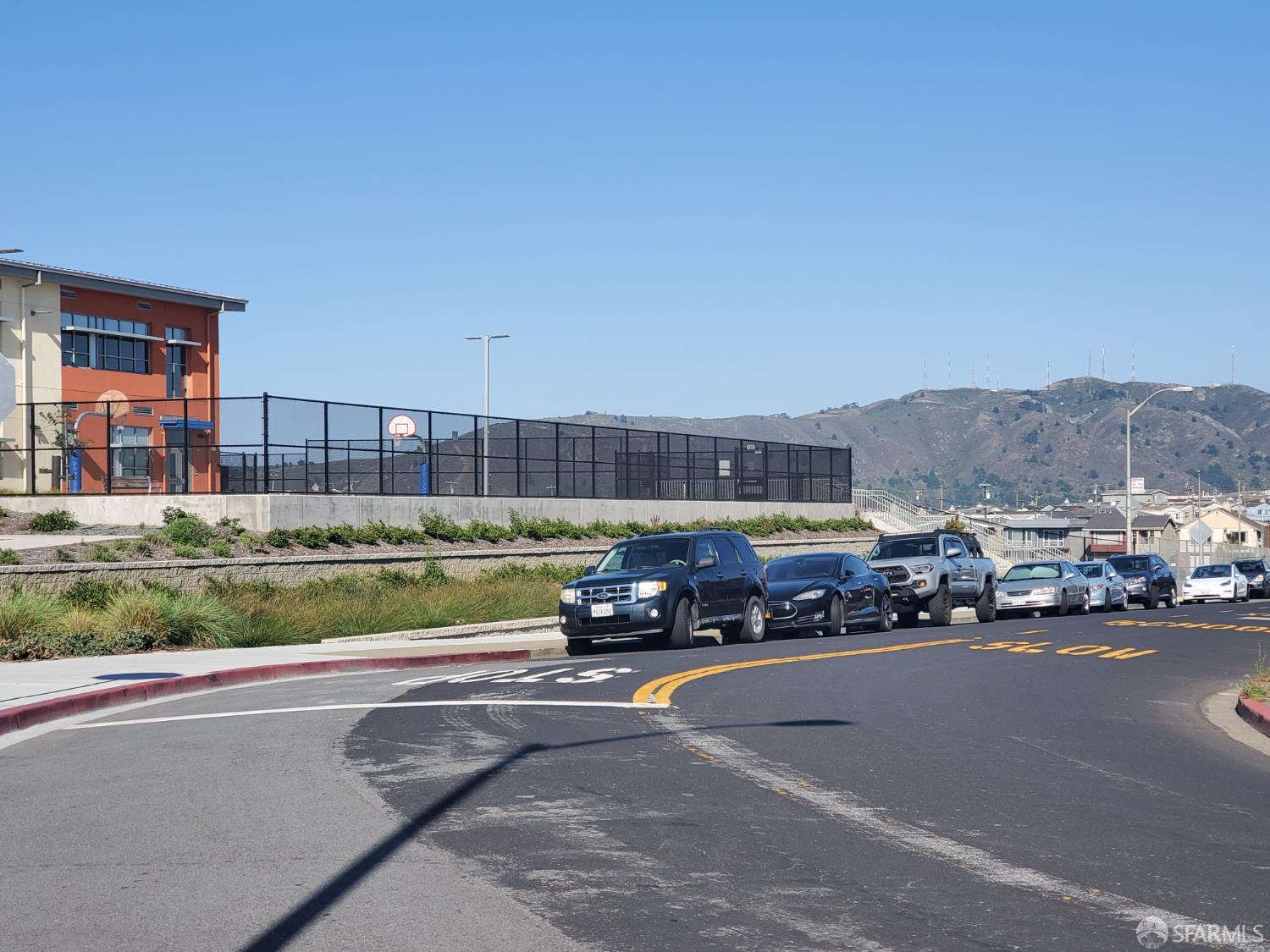 183 Mariposa Avenue Daly City, CA 94015 - Photo 6 of 27 a car parked on the side of the road