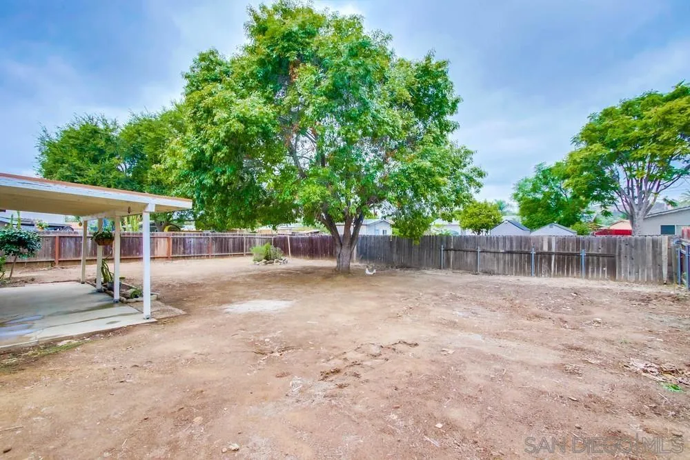 14574 Kennebunk Street Poway, CA 92064 - Photo 24 of 30 front view of a house with a yard