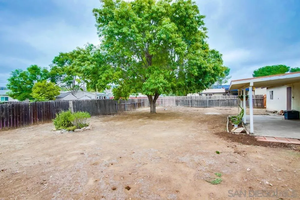 14574 Kennebunk Street Poway, CA 92064 - Photo 27 of 30 a backyard of a house with table and chairs
