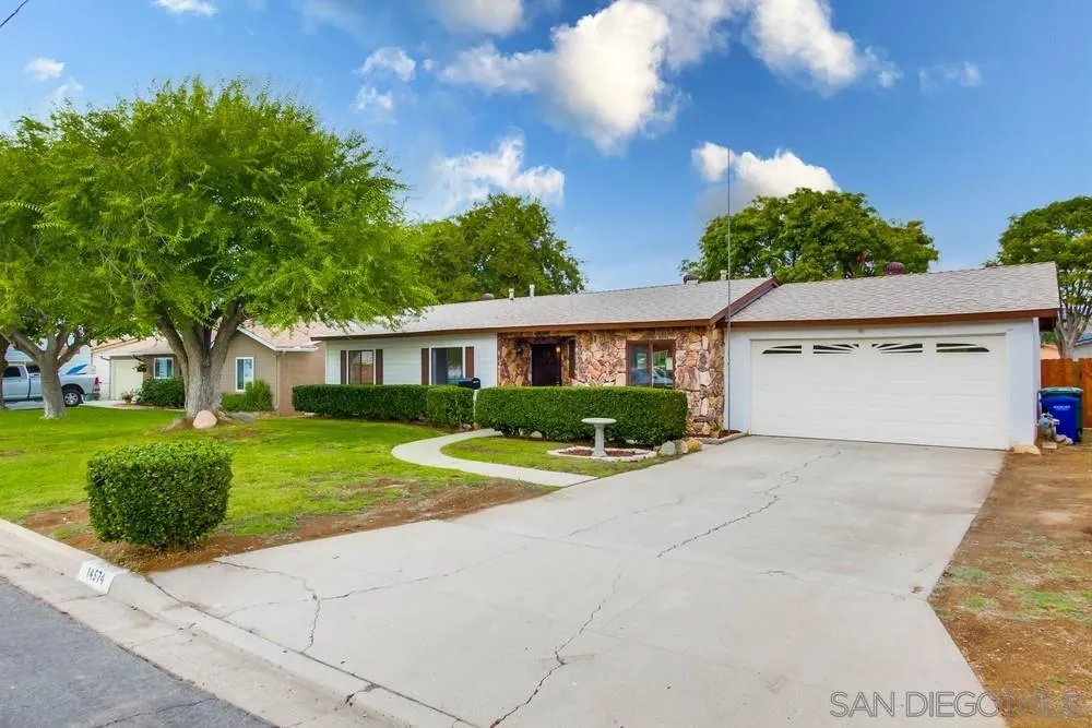 14574 Kennebunk Street Poway, CA 92064 - Photo 29 of 30 front view of house with a yard