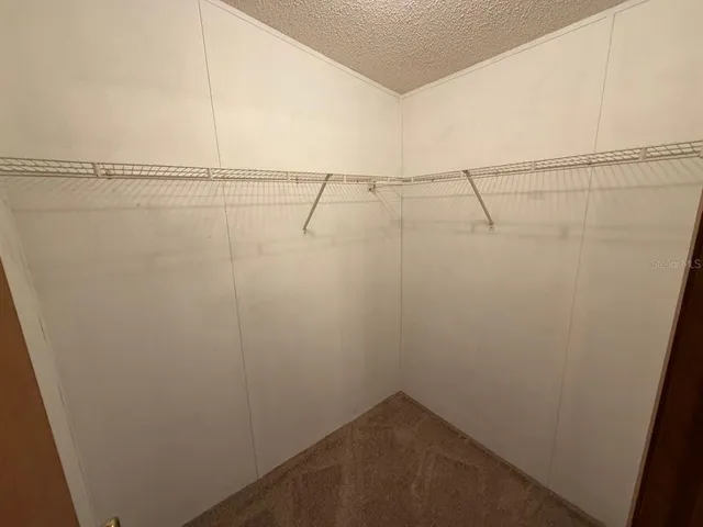 a view of a room with racks on the wall