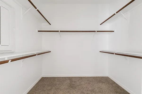 a view of a room with racks on the wall