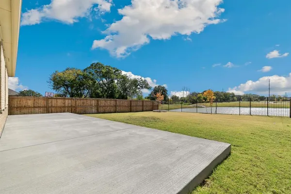 a view of an outdoor space and tennis court