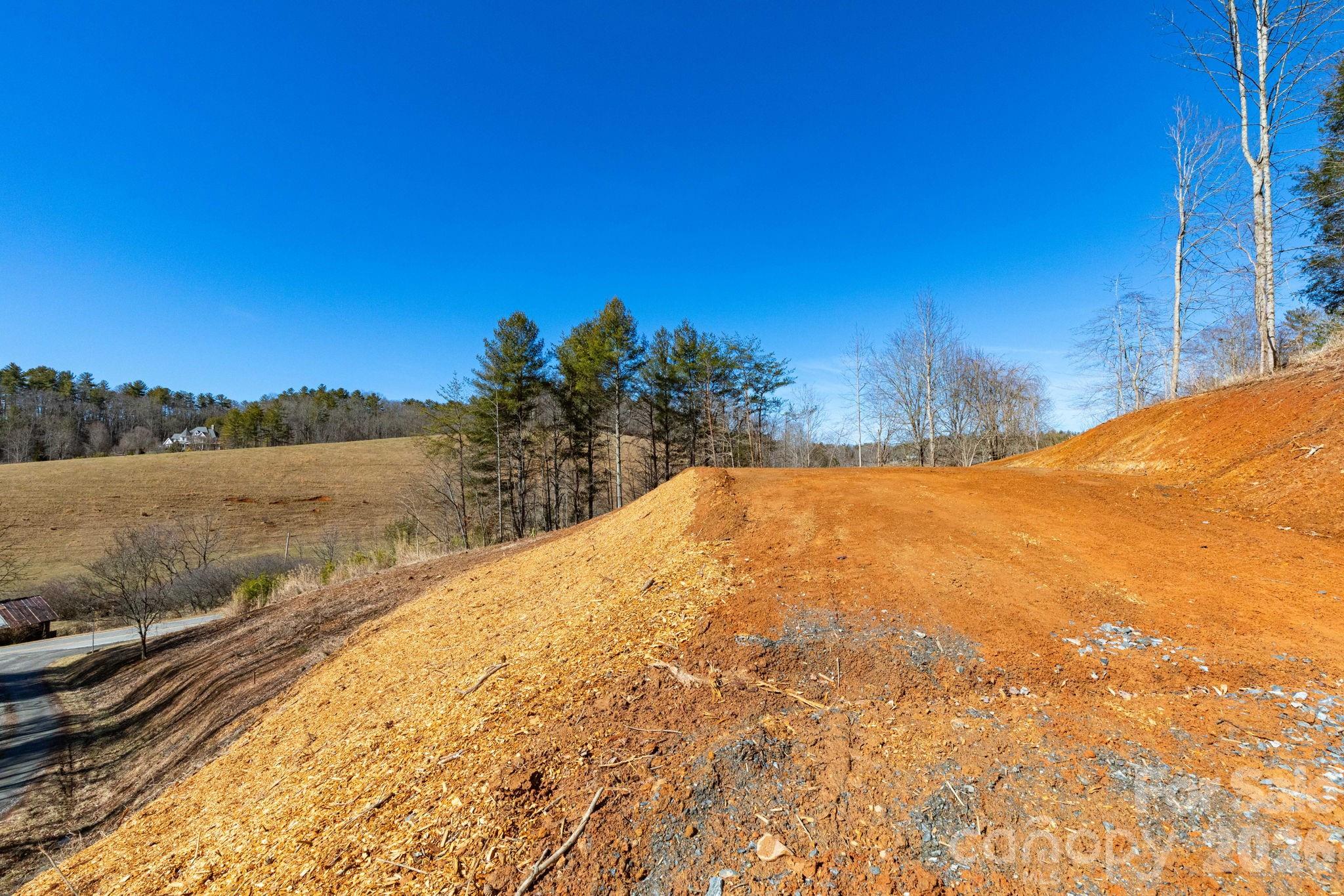 Tbd Kelly Hunter Road Marshall, NC 28753 - Photo 14 of 26 a view of a lake with a mountain in the background