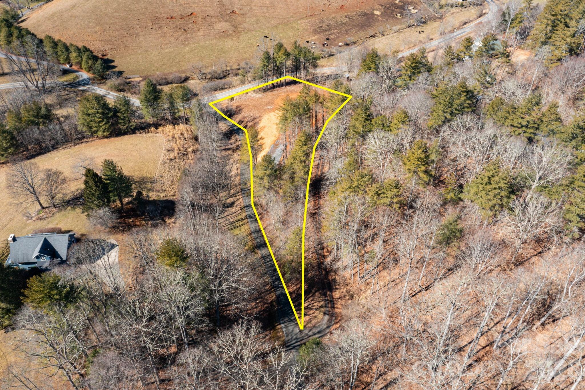 Tbd Kelly Hunter Road Marshall, NC 28753 - Photo 24 of 26 a view of a yard with wooden fence