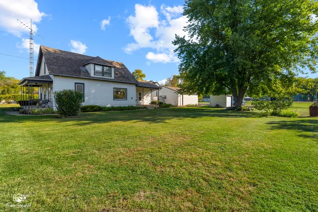 a house view with swimming pool