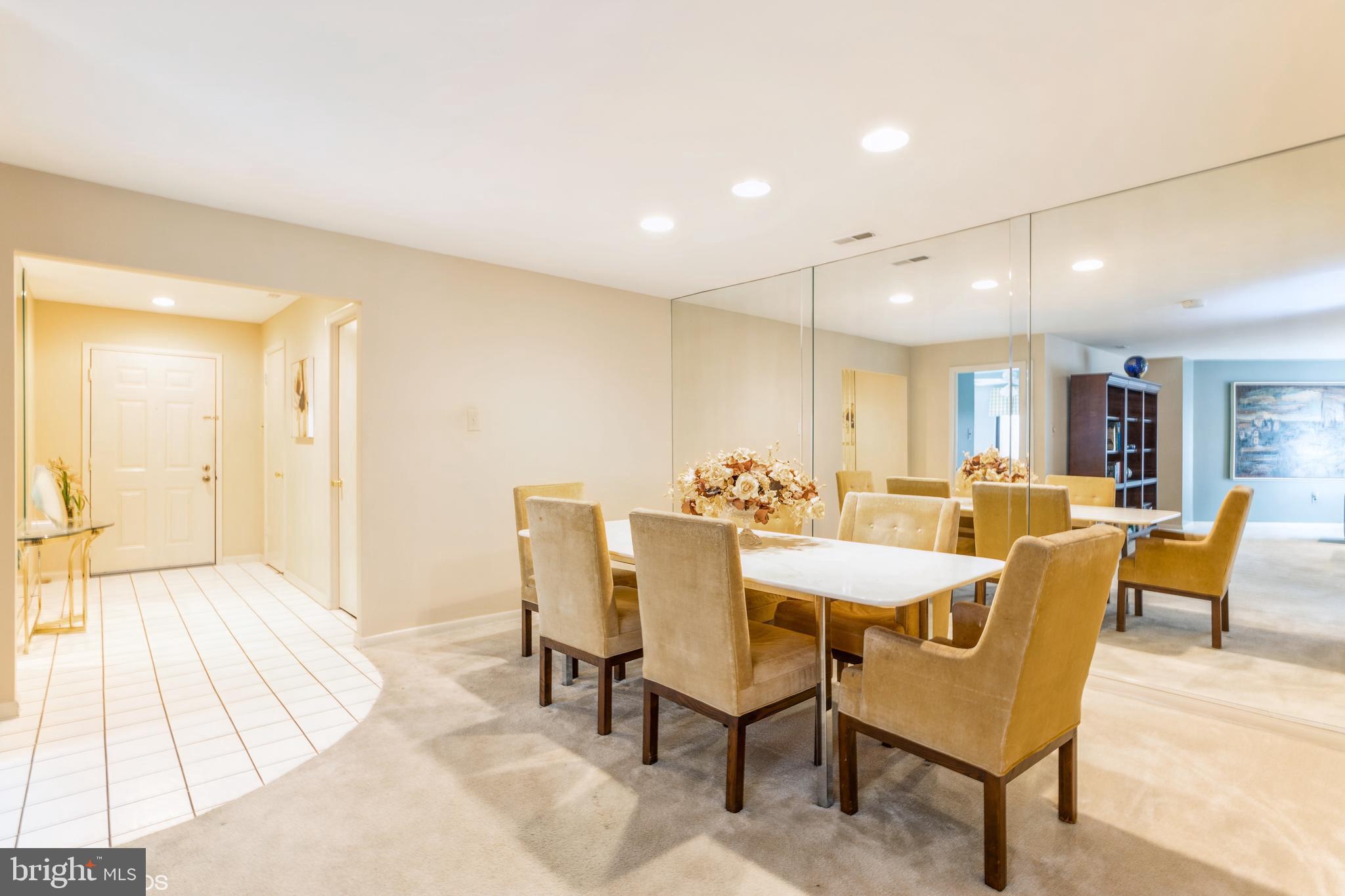 3041 Fallstaff Road, Unit 502D Baltimore, MD 21209 - Photo 15 of 45 a view of a dining room with furniture