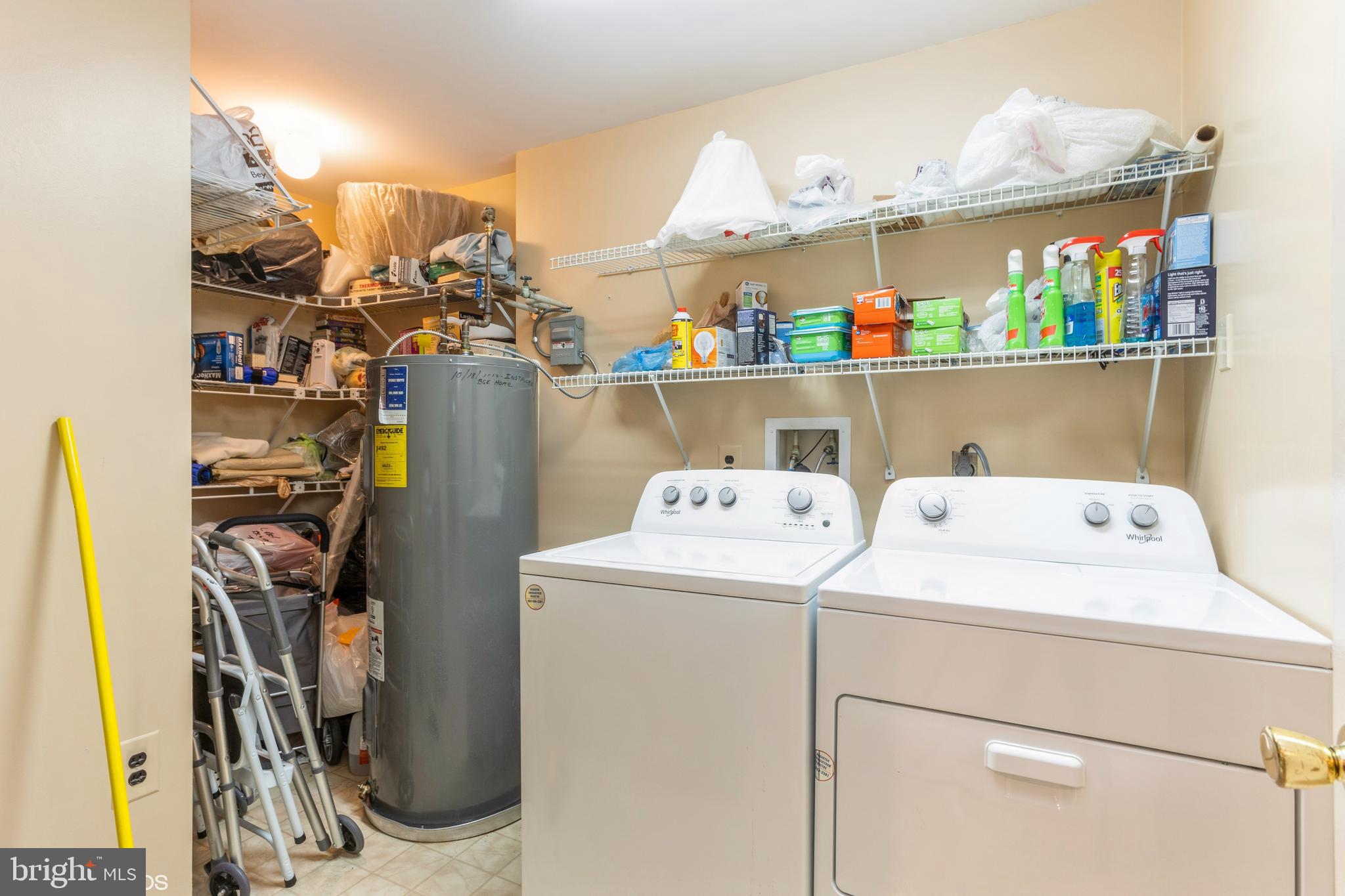 3041 Fallstaff Road, Unit 502D Baltimore, MD 21209 - Photo 44 of 45 a view of storage and utility room with washer and dryer