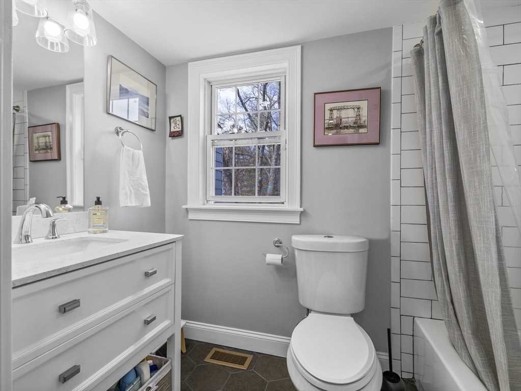 19 Cold Spring Road North Reading, MA 01864 - Photo 12 of 37 a bathroom with a toilet sink and mirror