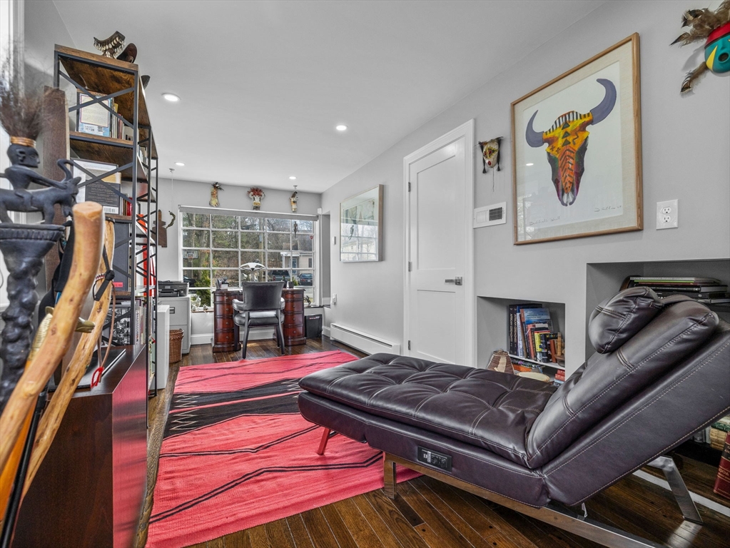 19 Cold Spring Road North Reading, MA 01864 - Photo 13 of 37 a living room with furniture and a flat screen tv