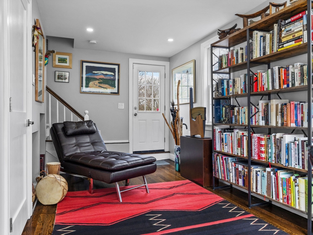 19 Cold Spring Road North Reading, MA 01864 - Photo 14 of 37 a room with furniture book shelf and wooden floor