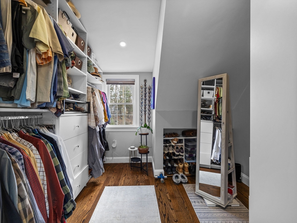 19 Cold Spring Road North Reading, MA 01864 - Photo 20 of 37 a view of walk in closet with clothes and shoes
