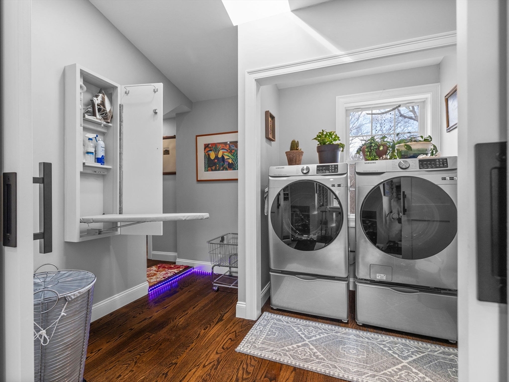 19 Cold Spring Road North Reading, MA 01864 - Photo 21 of 37 a utility room with cabinets dryer and washer