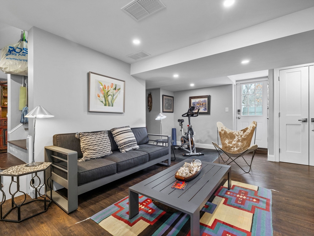 19 Cold Spring Road North Reading, MA 01864 - Photo 25 of 37 a living room with furniture and a table