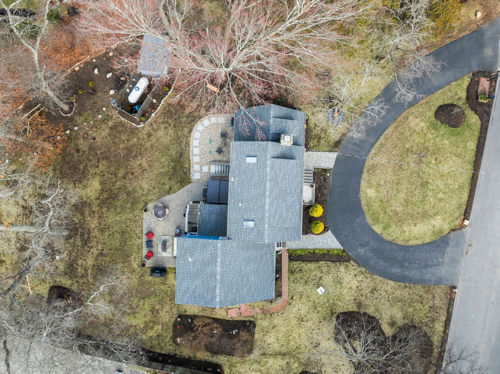 19 Cold Spring Road North Reading, MA 01864 - Photo 31 of 37 an aerial view of a house with a swimming pool