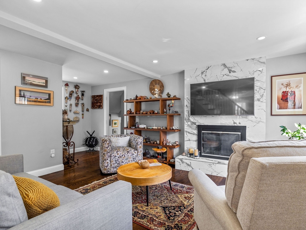19 Cold Spring Road North Reading, MA 01864 - Photo 10 of 37 a living room with furniture and a flat screen tv