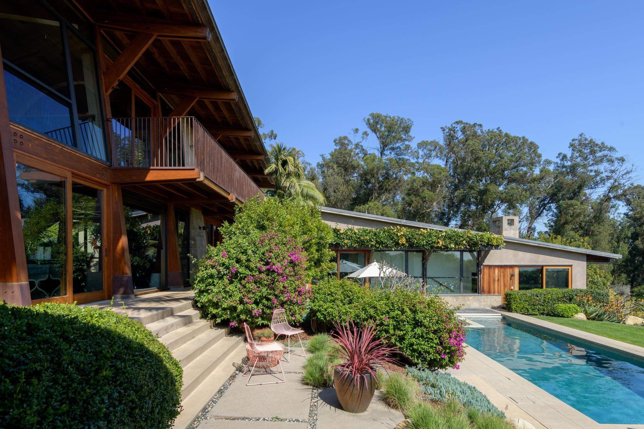 4038 Foothill Road Carpinteria, CA 93013 - Photo 11 of 36 a view of a house with a flower garden