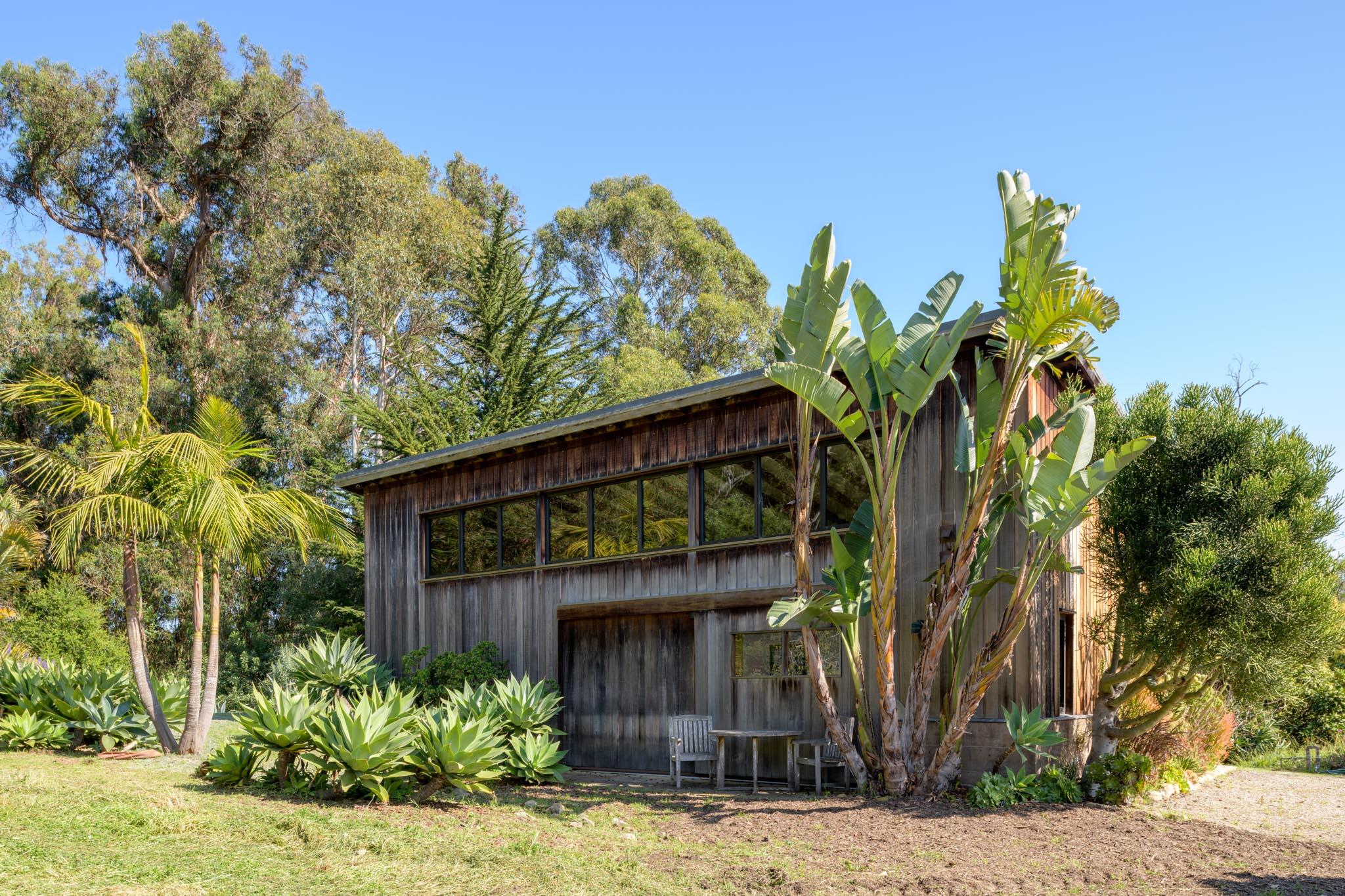 4038 Foothill Road Carpinteria, CA 93013 - Photo 35 of 36 a front view of a house with a yard
