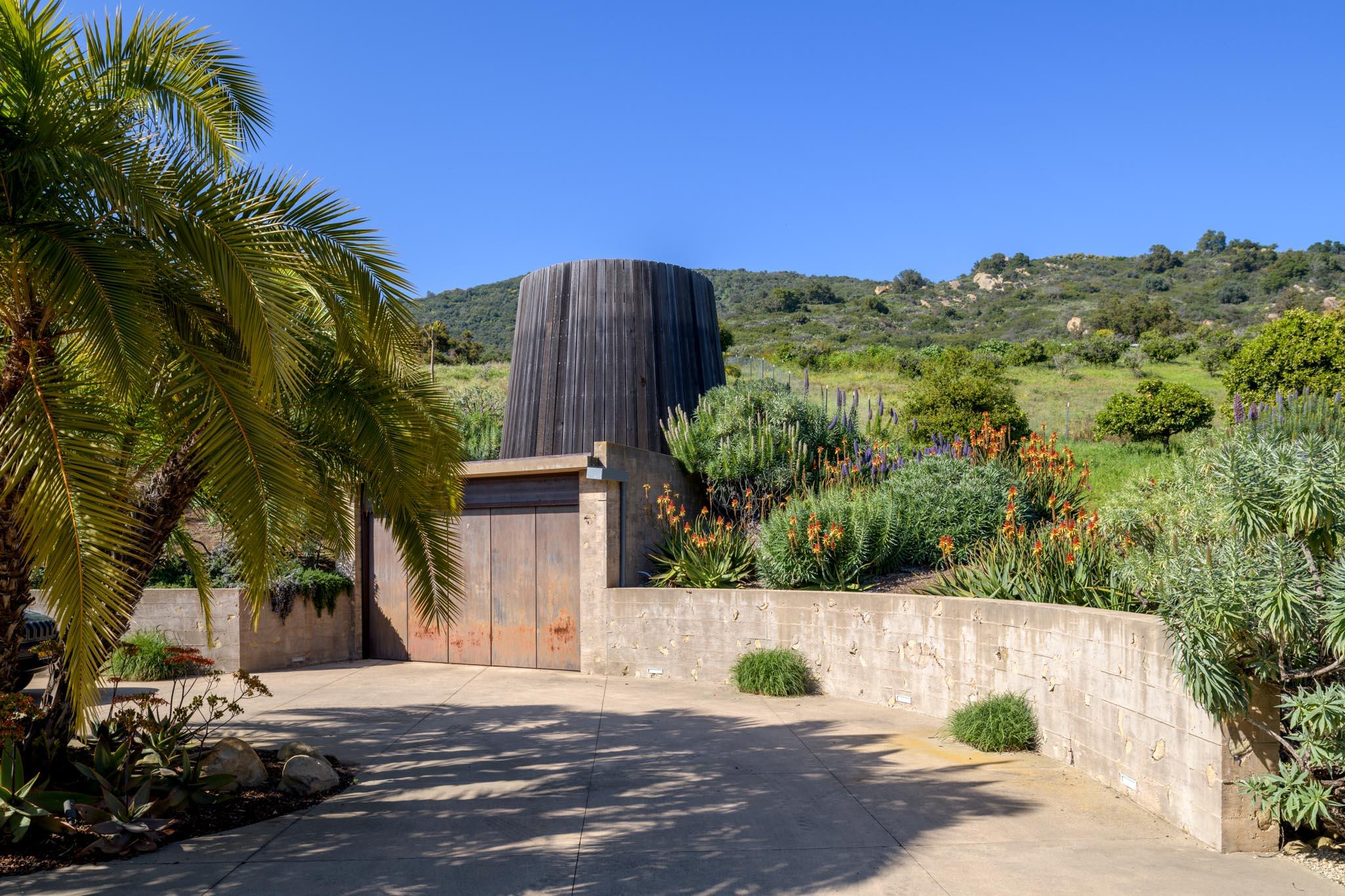 4038 Foothill Road Carpinteria, CA 93013 - Photo 36 of 36 a view of a yard with plants and a large tree