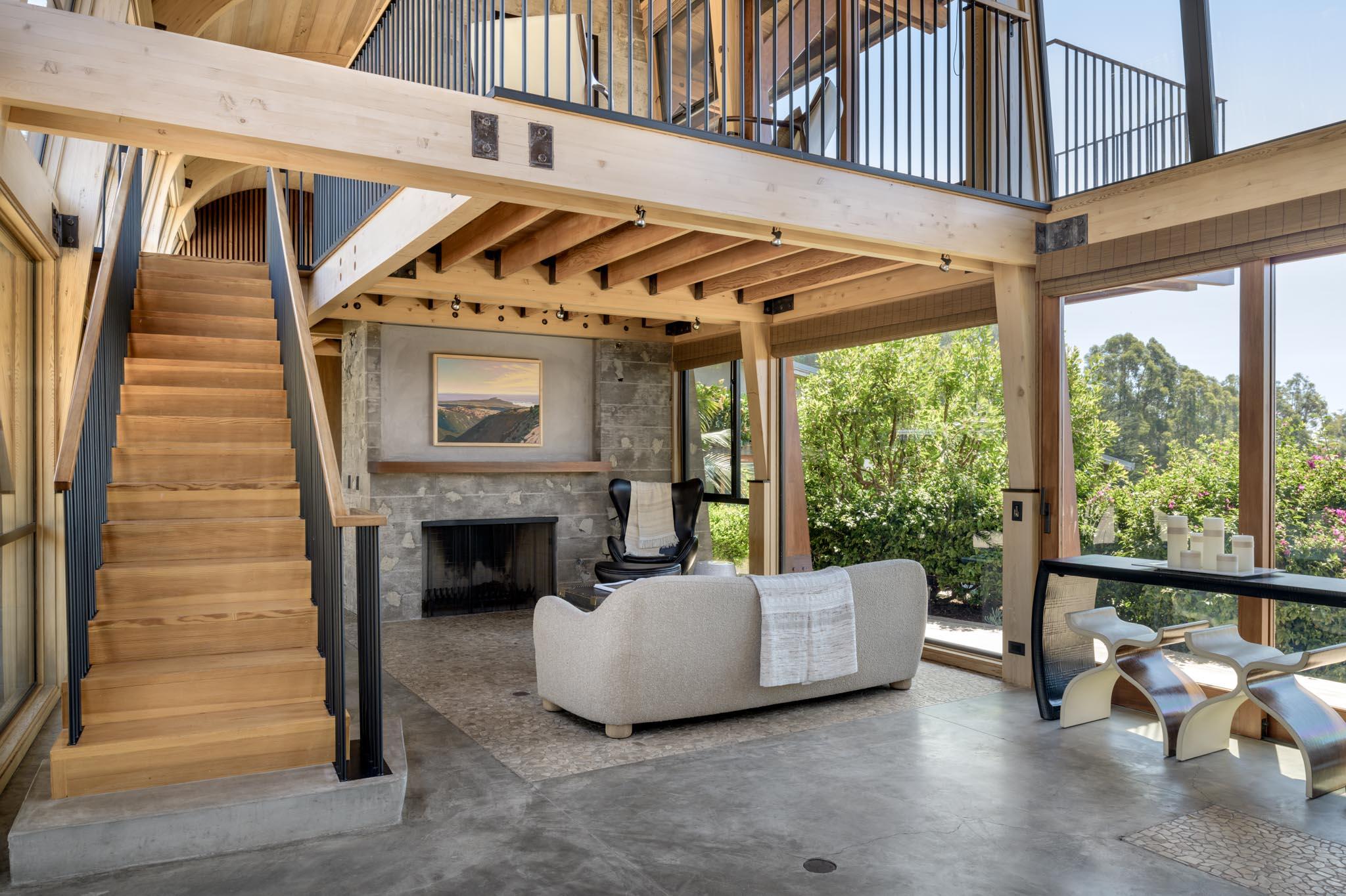 4038 Foothill Road Carpinteria, CA 93013 - Photo 4 of 36 a living room with furniture and a fireplace