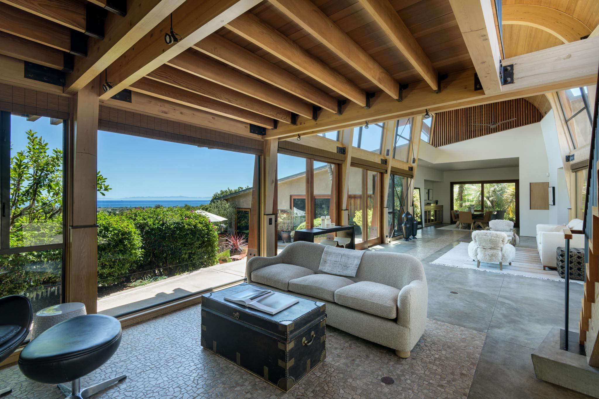 4038 Foothill Road Carpinteria, CA 93013 - Photo 5 of 36 a living room with patio furniture and a potted plant