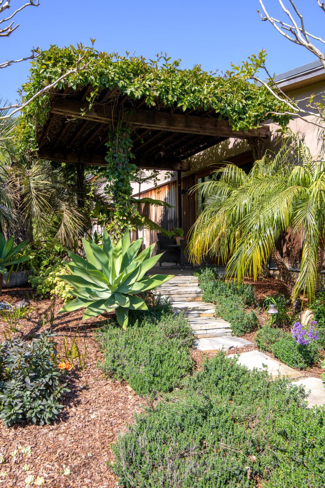 4038 Foothill Road Carpinteria, CA 93013 - Photo 9 of 36 a view of a garden with plants