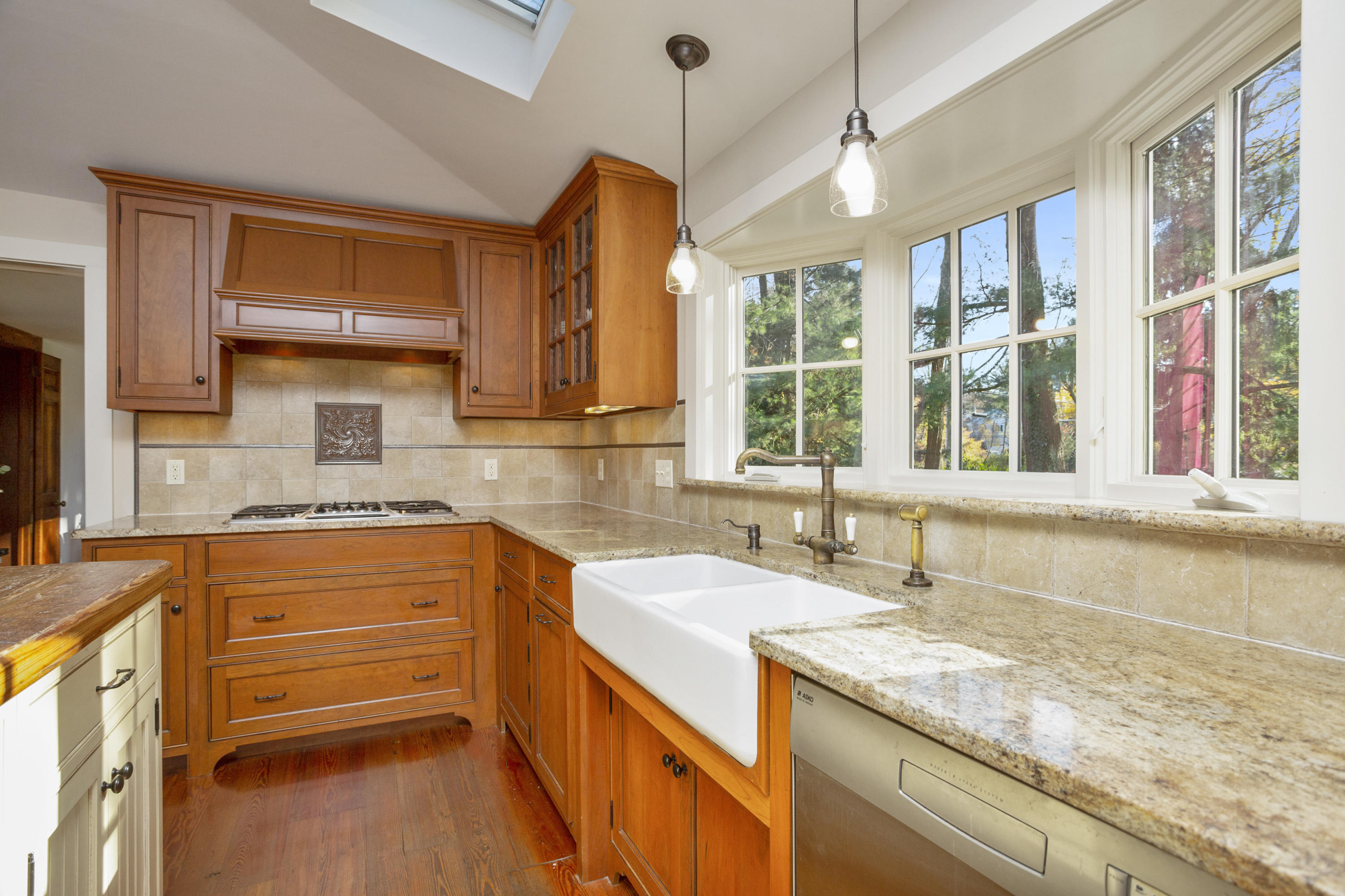 315 Middlesex Road Darien, CT 06820 - Photo 22 of 59 a kitchen that has a sink and a large window in it