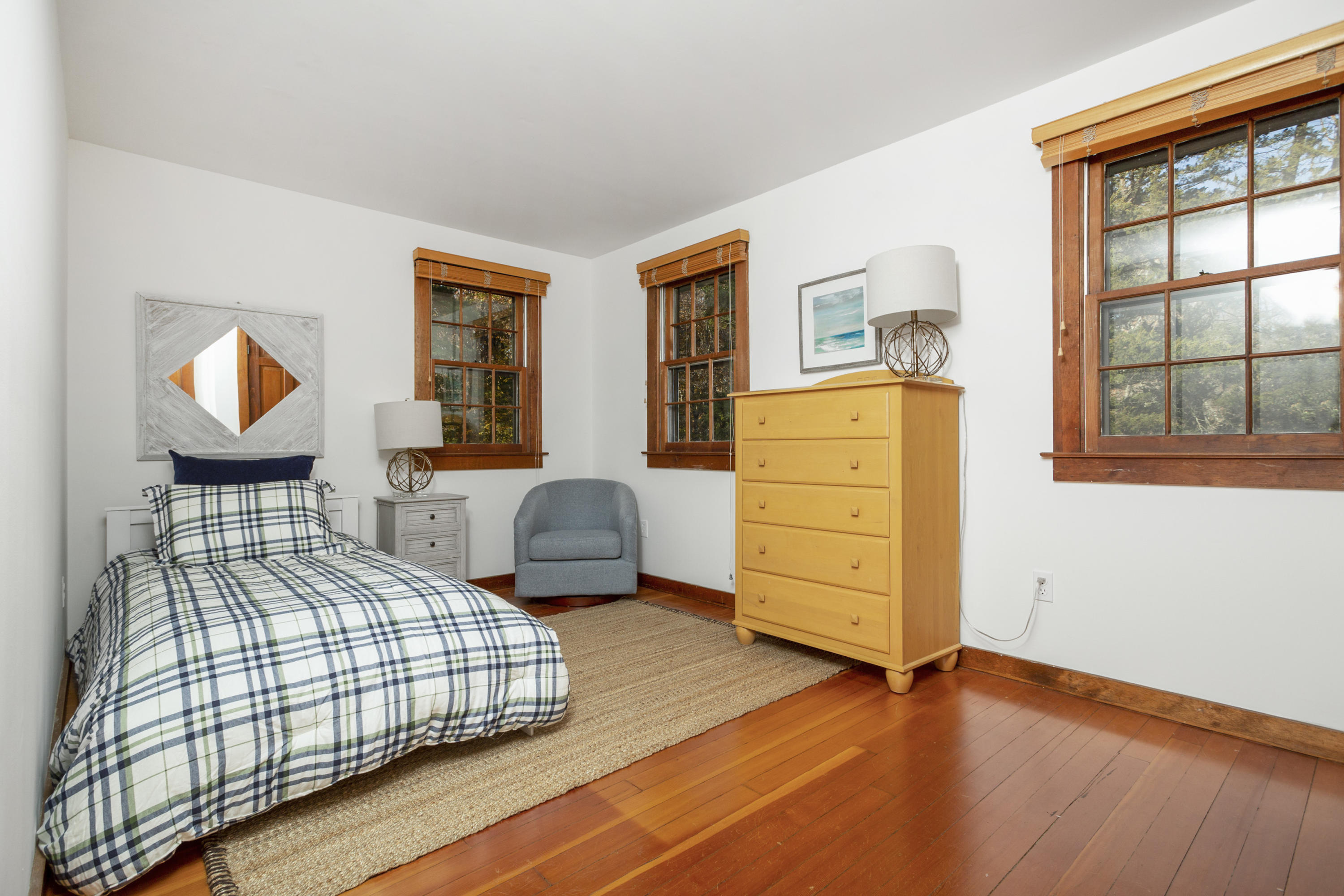 315 Middlesex Road Darien, CT 06820 - Photo 44 of 59 a bedroom with furniture and wooden floor