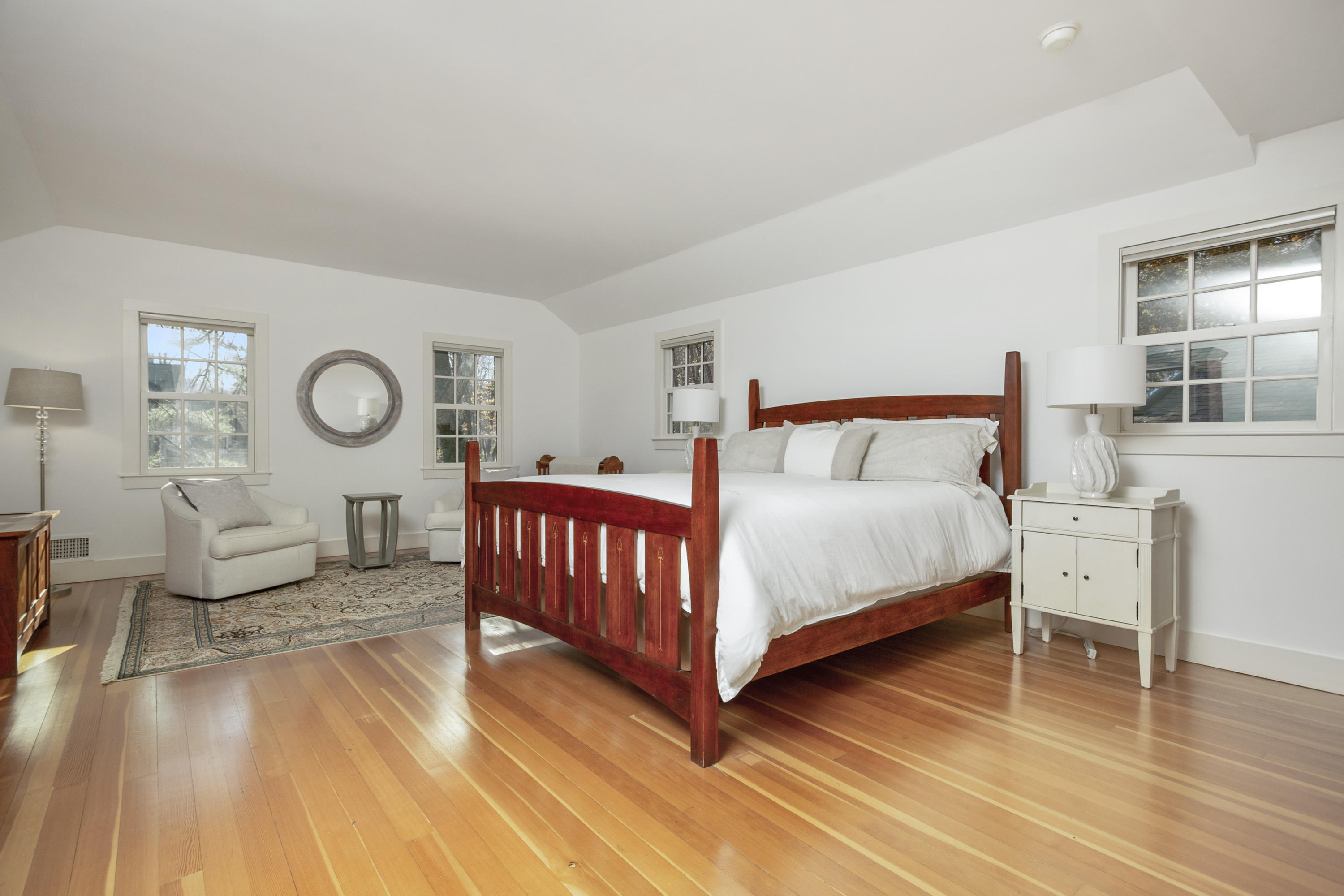 315 Middlesex Road Darien, CT 06820 - Photo 45 of 59 a bedroom with a bed and a table
