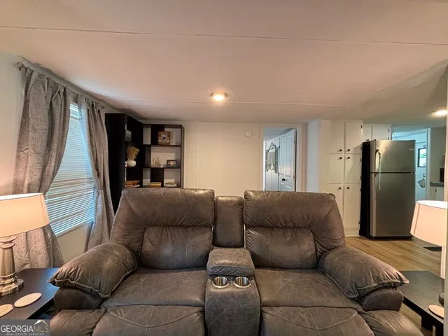 a living room with furniture and a couch