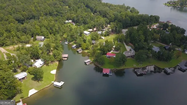 a view of a chairs and table in the patio
