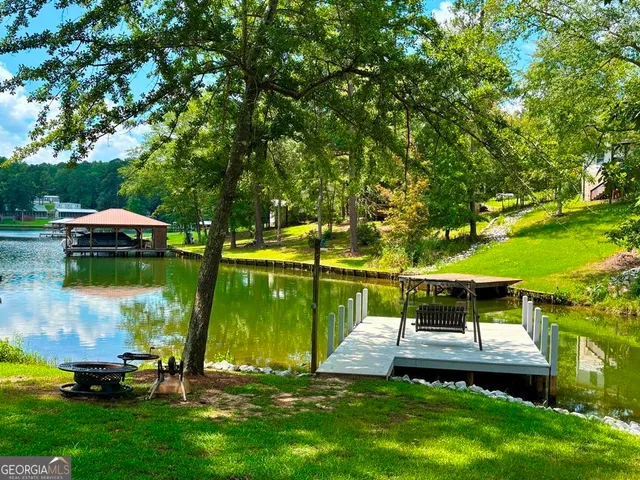 a view of a lake with a deck