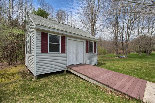 92 Scobie Pond Road Derry, NH 03038 - Photo 5 of 30 a view of a house with a yard