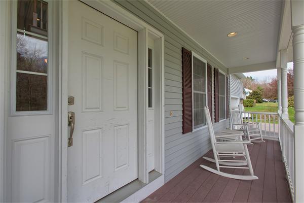 92 Scobie Pond Road Derry, NH 03038 - Photo 8 of 30 a view of a deck with wooden floor and fence