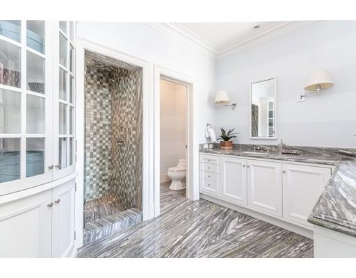 5 Charles River Square Boston, MA 02114 - Photo 16 of 21 a bathroom with a sink a toilet and a mirror