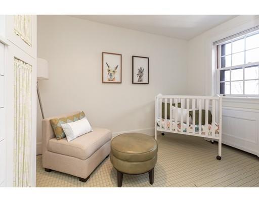 5 Charles River Square Boston, MA 02114 - Photo 19 of 21 a living room with furniture and a window