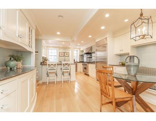 5 Charles River Square Boston, MA 02114 - Photo 3 of 21 a living room with stainless steel appliances kitchen island granite countertop furniture and a kitchen view