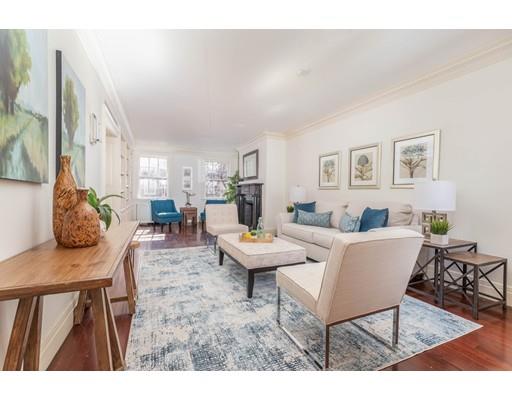 5 Charles River Square Boston, MA 02114 - Photo 10 of 21 a living room with furniture and a table