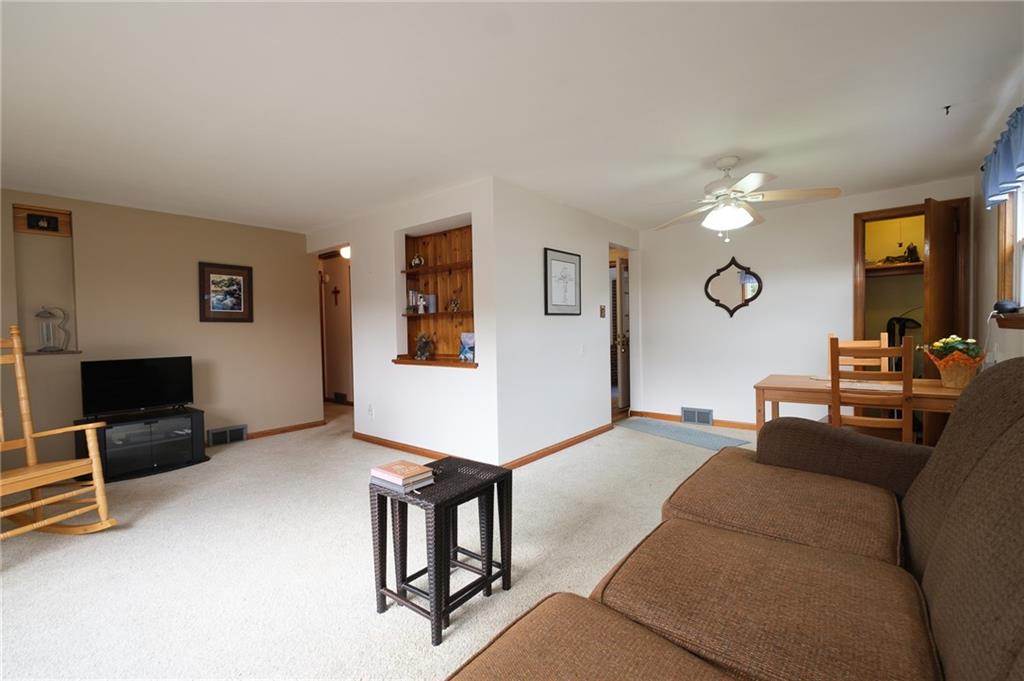 7538 Noblestown Road McDonald, PA 15057 - Photo 3 of 23 a living room with furniture and a flat screen tv