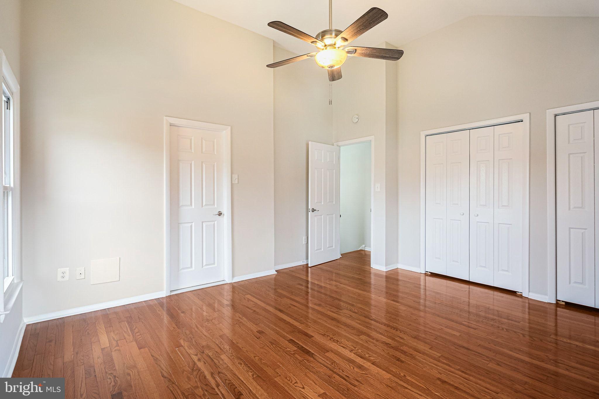 9304 Canterbury Riding, Unit 21 Laurel, MD 20723 - Photo 18 of 29 a view of empty room with wooden floor