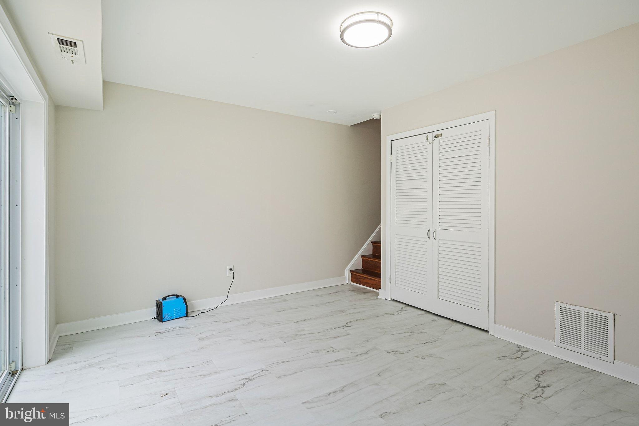9304 Canterbury Riding, Unit 21 Laurel, MD 20723 - Photo 23 of 29 an empty room with an entryway