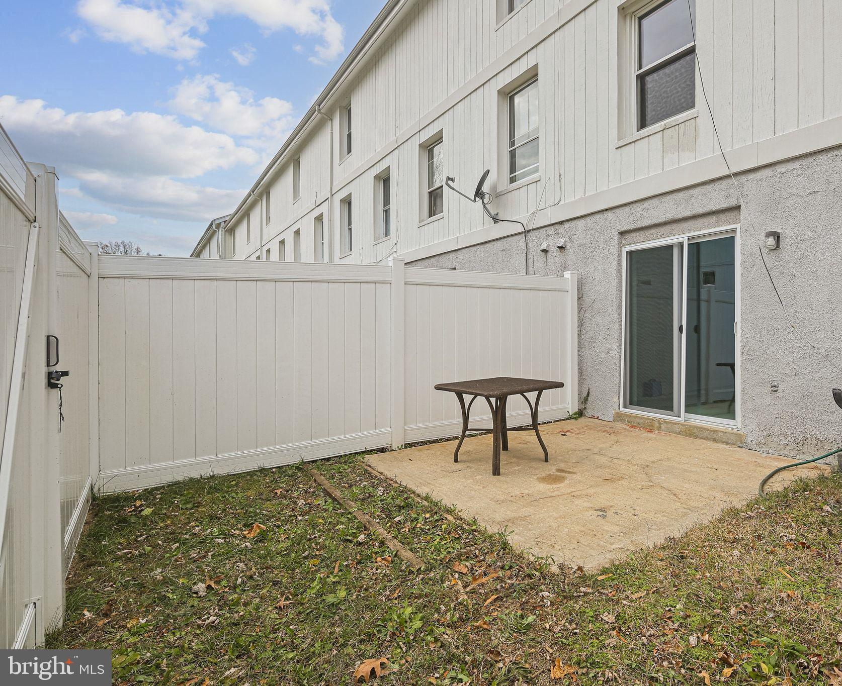 9304 Canterbury Riding, Unit 21 Laurel, MD 20723 - Photo 26 of 29 a view of an outdoor space with porch