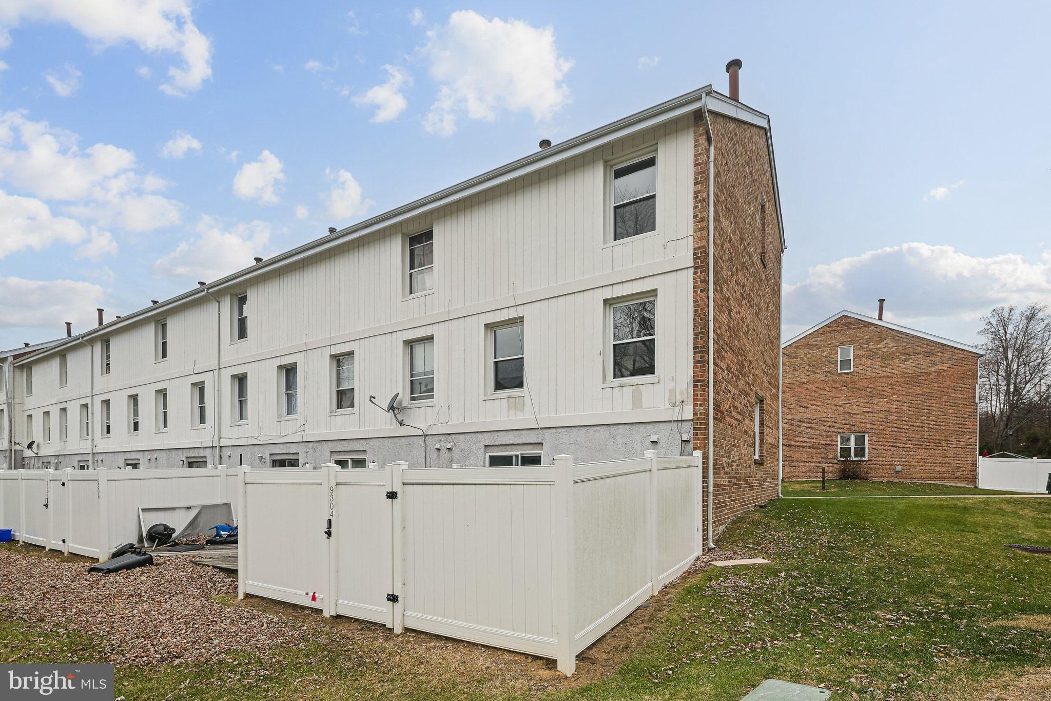 9304 Canterbury Riding, Unit 21 Laurel, MD 20723 - Photo 27 of 29 a view of a house with backyard