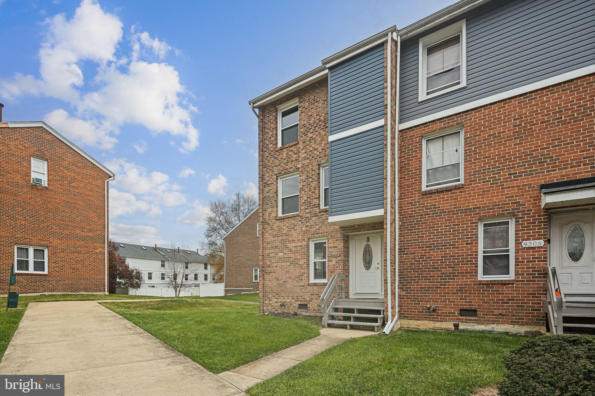 9304 Canterbury Riding, Unit 21 Laurel, MD 20723 - Photo 3 of 29 a view of a house with a yard