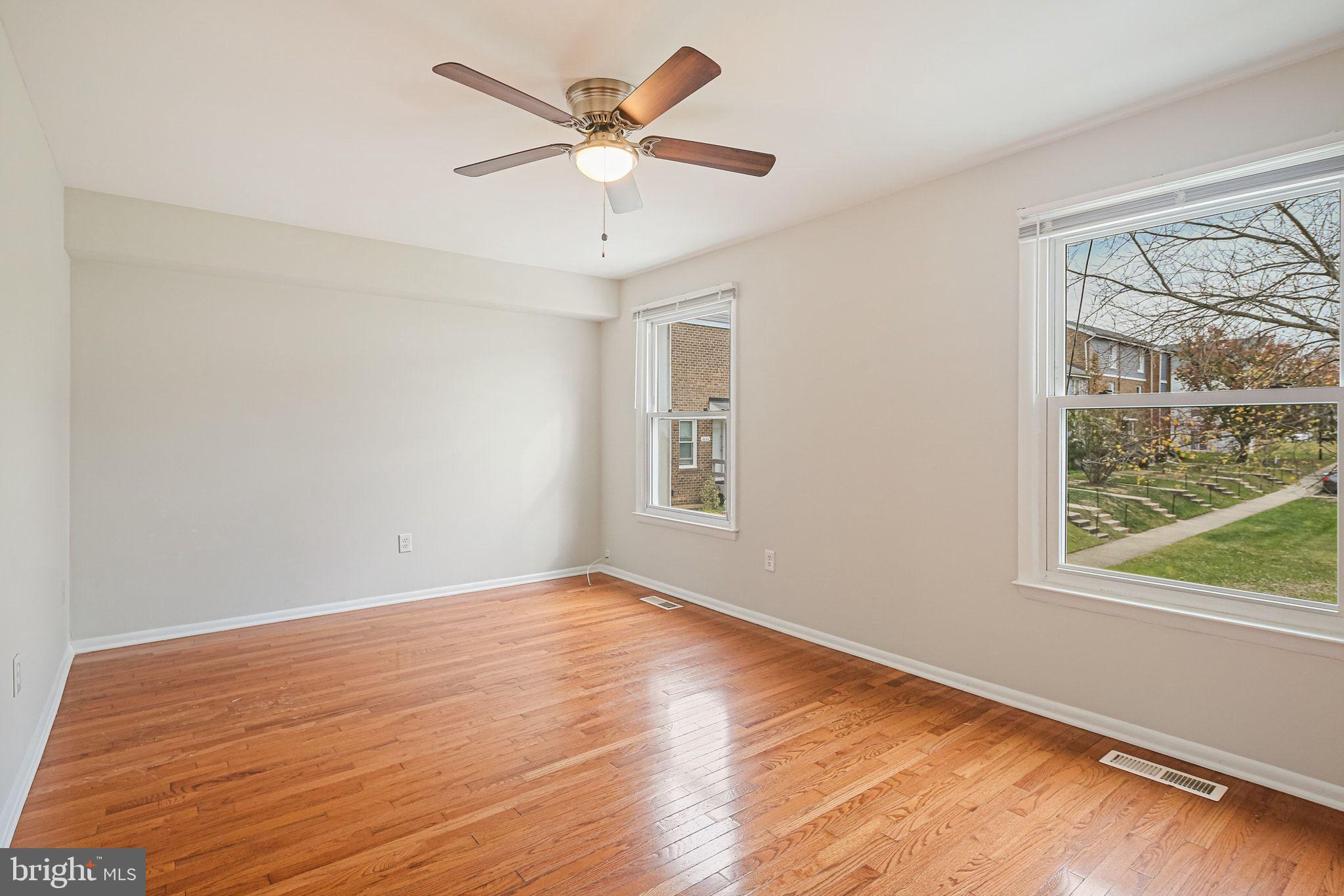9304 Canterbury Riding, Unit 21 Laurel, MD 20723 - Photo 9 of 29 a view of an empty room with a window
