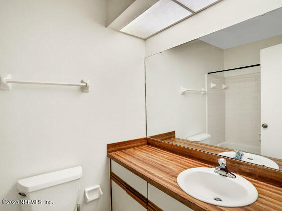 85 Debarry Avenue, Unit 1066 Orange Park, FL 32073 - Photo 16 of 24 a bathroom with a sink and a mirror
