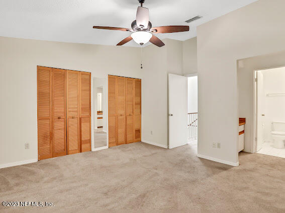 85 Debarry Avenue, Unit 1066 Orange Park, FL 32073 - Photo 20 of 24 a view of an empty room with a chandelier fan